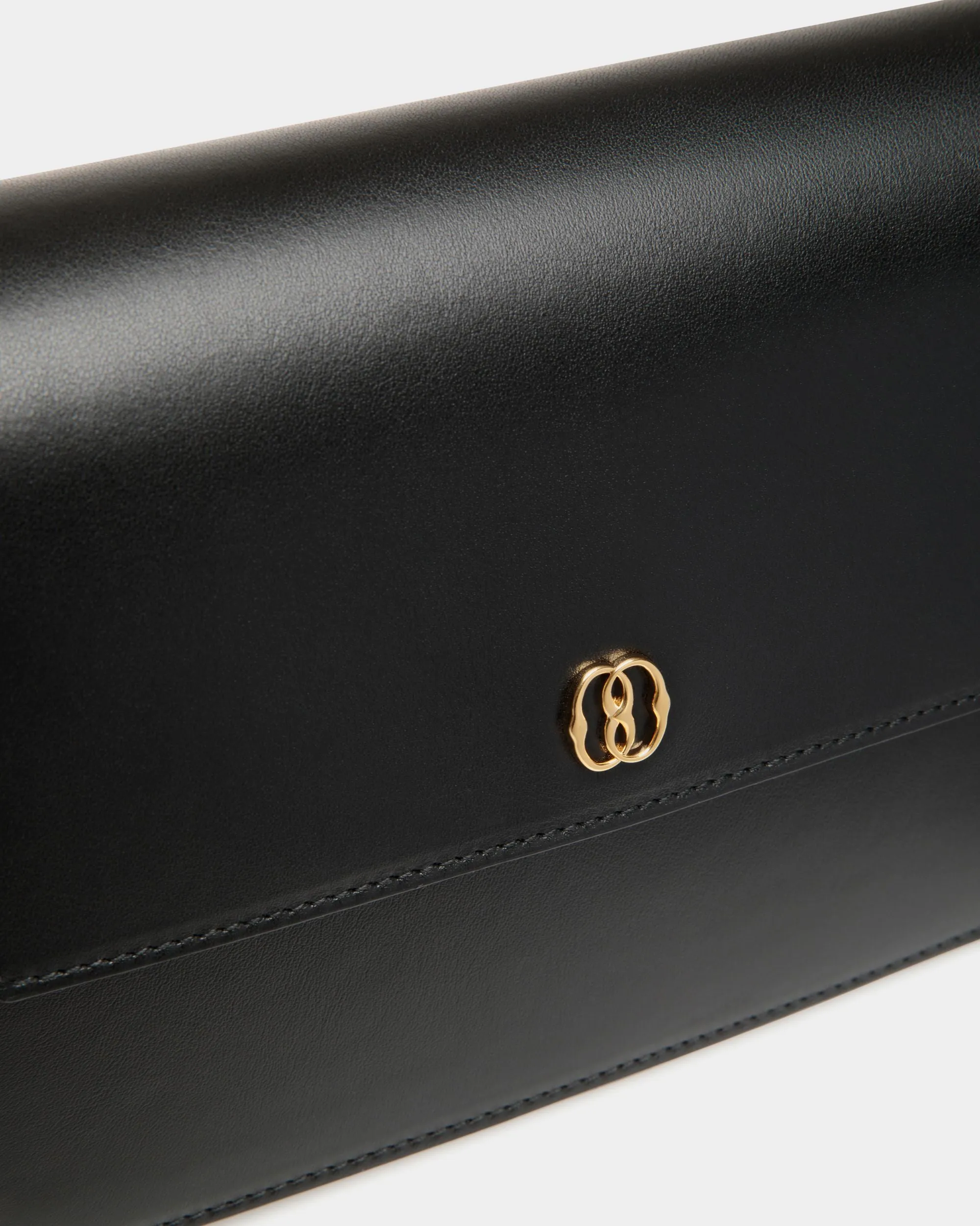 Emblem Small Crossbody Bag In Black Leather 