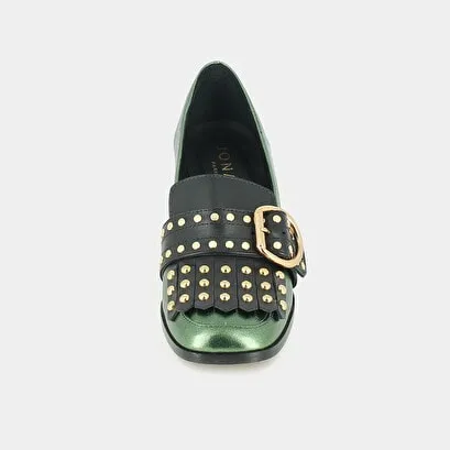 Heeled moccasins in green metallic leather with fringed tab and cabochons