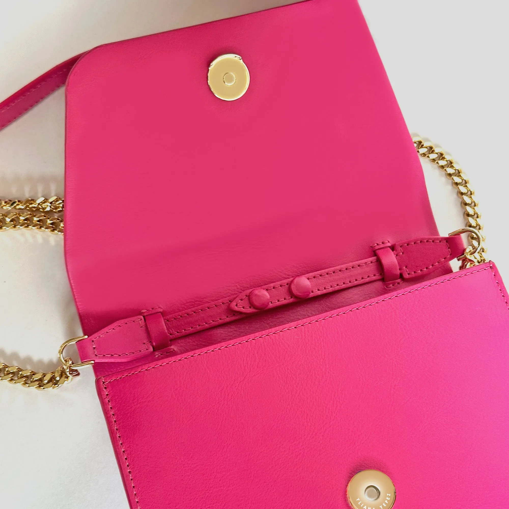 Mini Giovanna fuchsia braided clutch